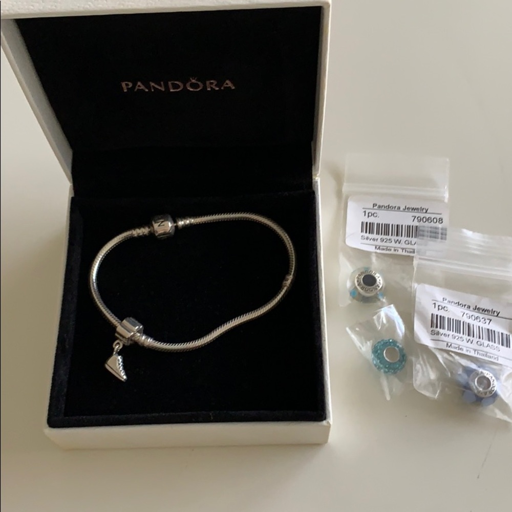 Pandora bracelet and 4 charms NWT